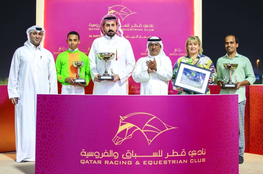 Connections of Afandem celebrate after the seven-year-old bay horse won the Al Mafiar Cup at Qatar Racing and Equestrian Club’s 
Al Rayyan Racecourse on Wednesday. PICTURES: Juhaim