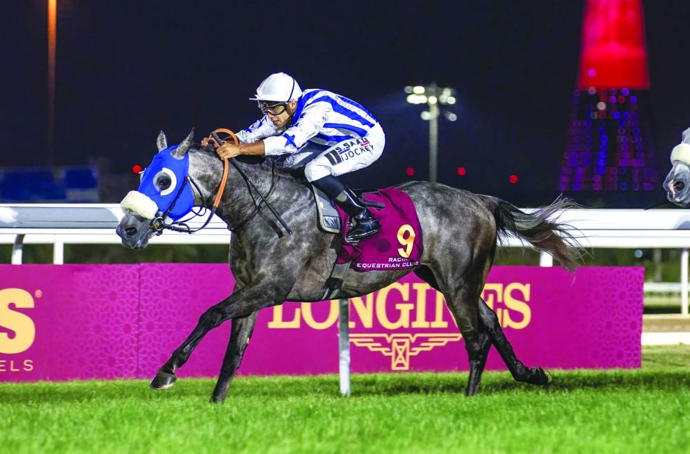 Jockey Soufiane Saadi rides Fayq Al Shahania to the Msheireb Cup on Thursday.