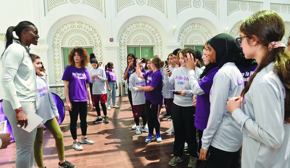 WNBA icon Sylvia Fowles with aspiring female basketball players at the event Friday at Education City. PICTURE: Shaji Kayamkulam