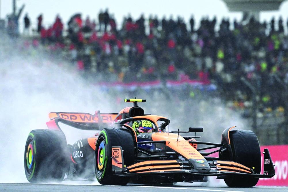 McLaren’s British driver Lando Norris drives during the sprint qualifying session ahead of the Chinese Grand Prix at the Shanghai International Circuit in Shanghai on Friday. (AFP)