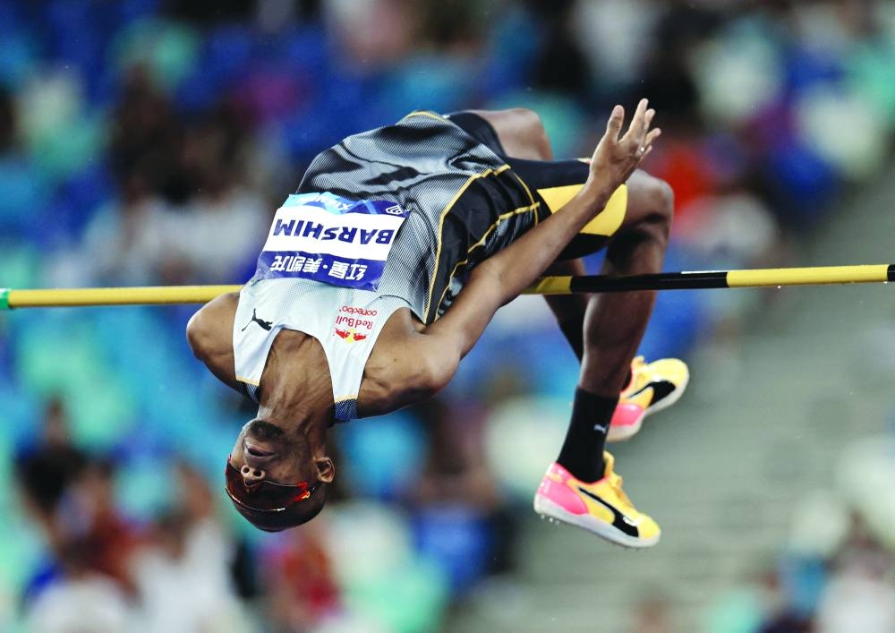 Qatar’s Mutaz Barshim clears the bar during the men’s high jump event at the Xiamen Diamond League in China on Saturday. (Reuters)