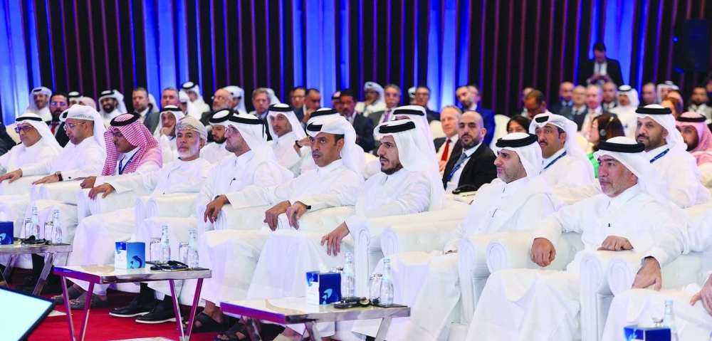 HE the Minister of Commerce and Industry Sheikh Mohamed bin Hamad bin Qassim al-Thani, Qatar Central Bank governor Sheikh Bandar bin Mohamed bin Saoud al-Thani and QFMA chief executive officer Dr. Tamy bin Ahmad al-Binali, along with other dignitaries at the Third Arab Capital Markets conference. PICTURES: Shaji Kayamkulam.