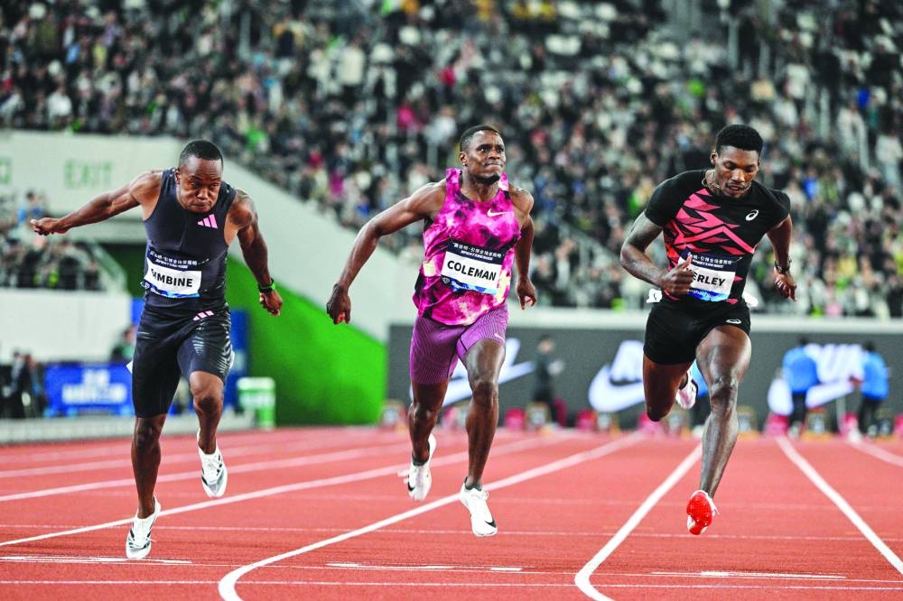 
South Africa’s Akani Simbine (left), finishes ahead of USA’s Christian Coleman (centre) and USA’s Fred Kerley in the men’s 100m in Suzhou. (AFP) 