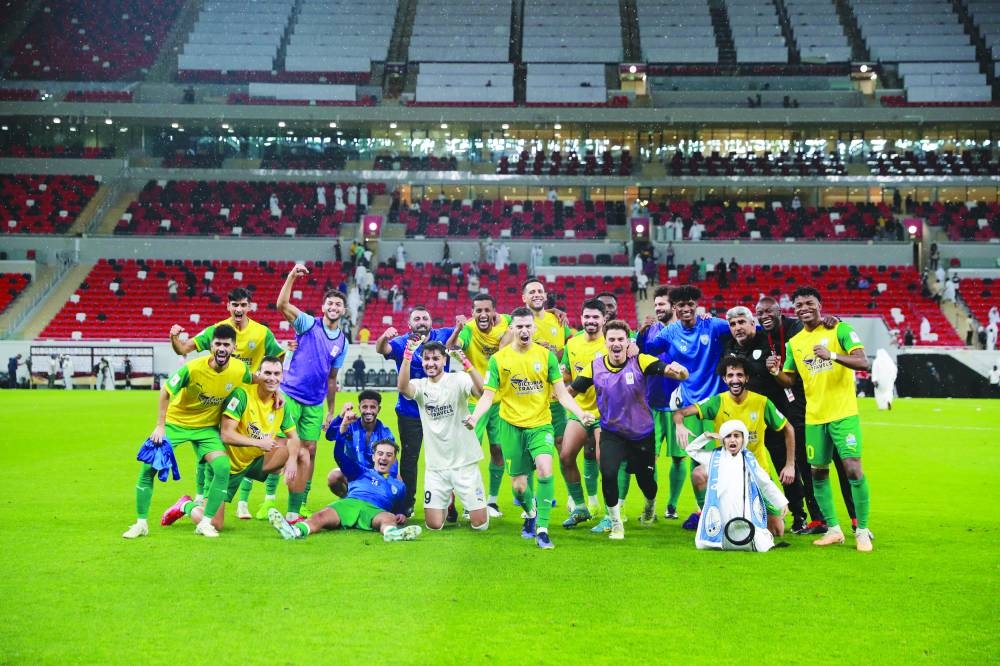 
Al Wakrah players celebrate after their win over Al Sadd in the Qatar Cup semi-finals at the Ahmad Bin Ali Stadium yesterday. 