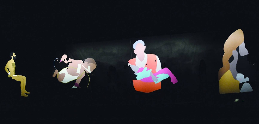 The exhibition features four powerful digital illustrations displayed on a mirrored wall.