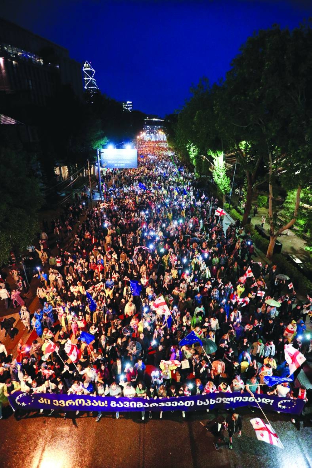 Demonstrators hold a rally to protest a bill on 'foreign agents' in Tbilisi.