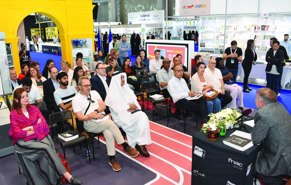 A view of the gathering at the book signing ceremony.