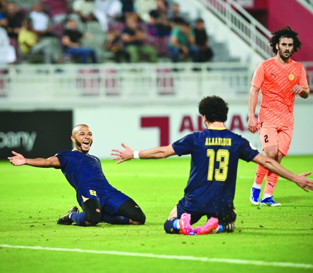 
Al Gharafa’s Yacine Brahimi (left) celebrates after scoring against Umm Salal at the Abdullah Bin Khalifa Stadium. 
