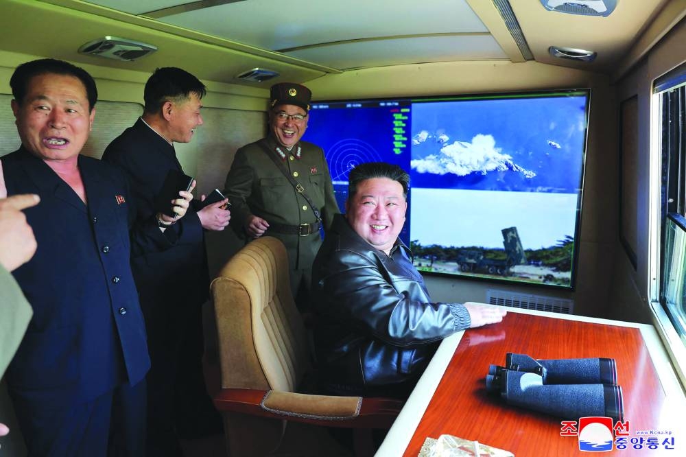 
North Korean leader Kim Jong-un inspecting a test fire of a tactical ballistic missile into which a new autonomous navigation system at an undisclosed location in North Korea. 