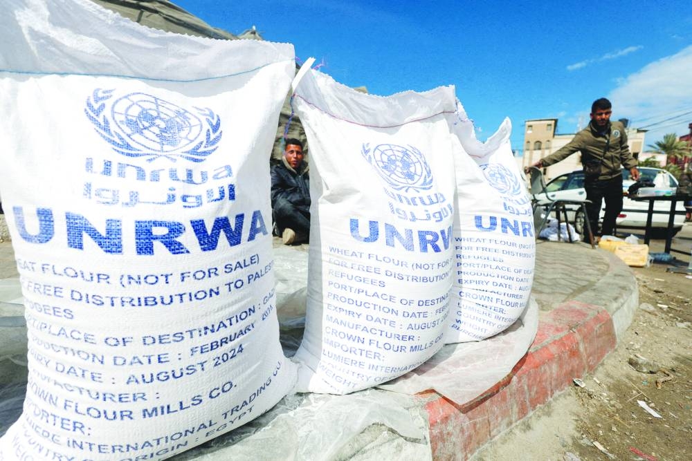 
File photo shows a displaced Palestinian waiting to receive United Nations Relief and Works Agency (UNRWA) aid, amid the ongoing conflict between Israel and the Palestinian Hamas group, in Rafah, in the southern Gaza Strip. 