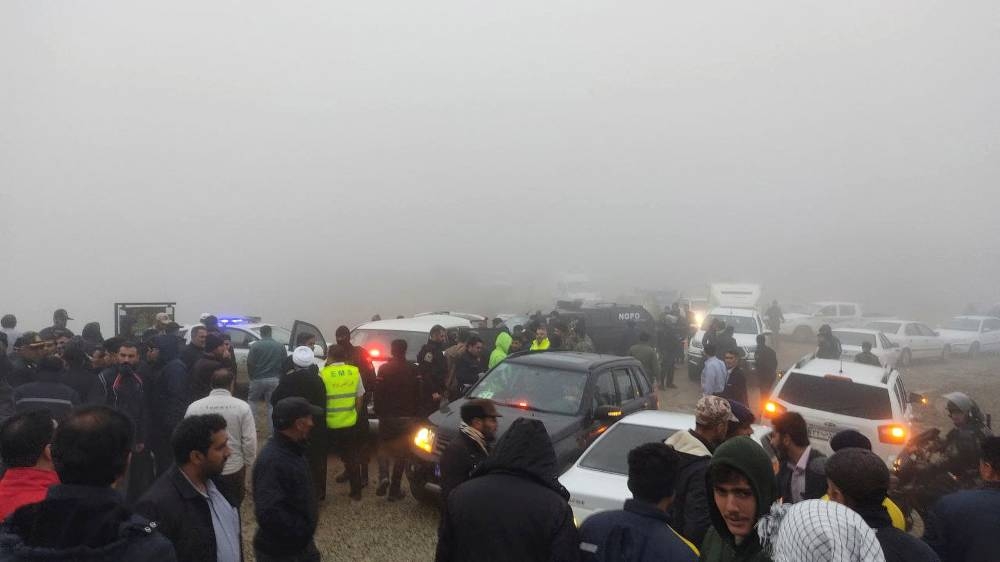 Rescue team works following a crash of a helicopter carrying Iran's President Ebrahim Raisi, in Varzaqan, East Azerbaijan Province, Iran on Sunday.  Azin Haghighi/Moj News Agency/WANA  via REUTERS