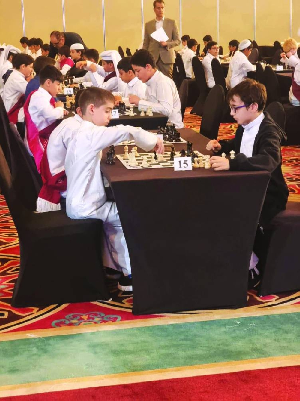 
Schoolchildren are seen playing chess in the Primary School Chess Championship (for public and private schools). 
 