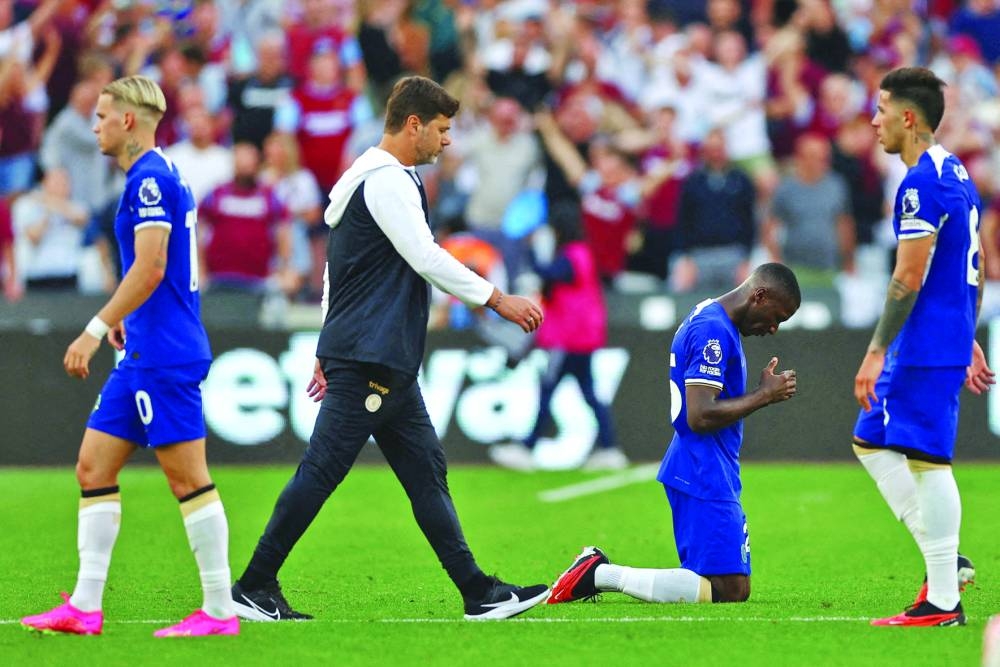 
Mauricio Pochettino (second left), who had a year left on his contract, was dismissed on Tuesday after Chelsea’s sixth place finish in the Premier League. (Reuters) 