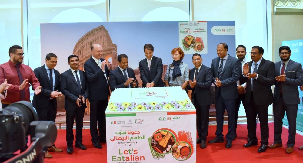 Celebrating the event with the ceremonial cutting of cake.