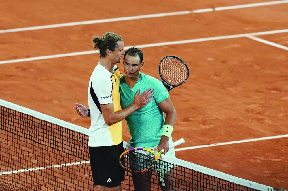 
Rafael Nadal and Alexander Zverev embrace after their match. (AFP) 