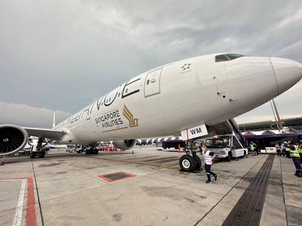 A Singapore Airlines aircraft is seen on tarmac after requesting an emergency landing at Bangkok's Suvarnabhumi International Airport, Thailand, on May 21. Pongsakornr Rodphai/Handout via REUTERS