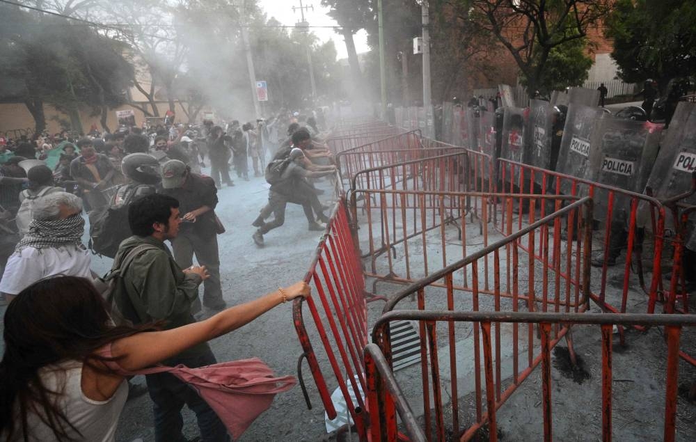 Demonstrators clash with police during a pro-Palestinian rally called "Urgent action for Rafah", held in front of the Israeli embassy in Mexico City on Tuesday. AFP