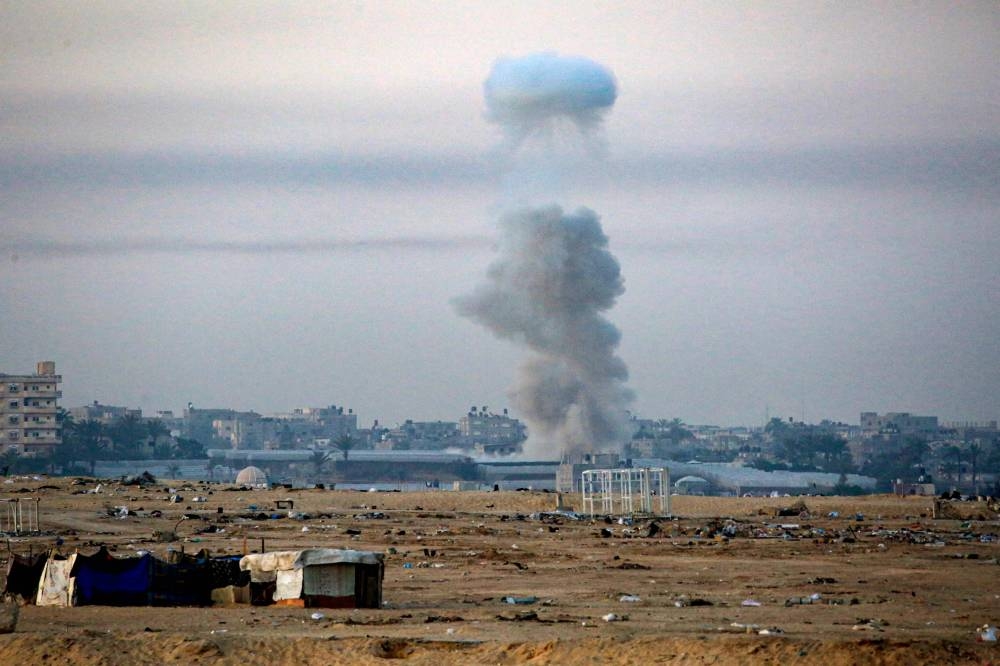 Smoke billows following Israeli bombardment in Rafah in the southern Gaza Strip on Friday. AFP