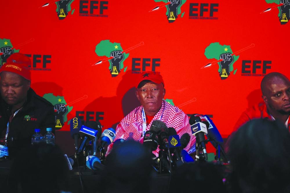 
Leader of the Economic Freedom Fighters Julius Malema looks on during the EFF press conference at the National Results Operation Centre of the Electoral Commission of South Africa, in Midrand. 