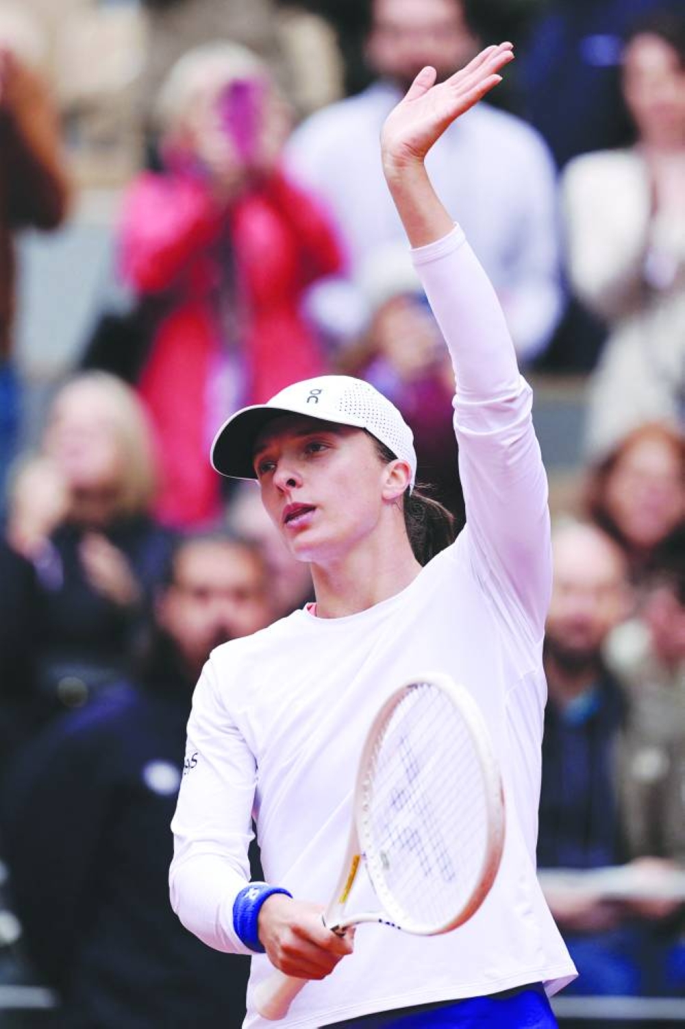 Poland’s Iga Swiatek celebrates after winning her match against Russia’s Anastasia Potapova in Paris on Sunday. (AFP)
