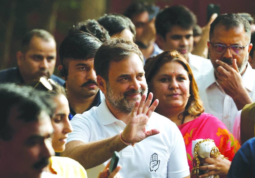 Rahul Gandhi, a senior leader of India’s main opposition Congress party, waves as he arrives at the party headquarters in New Delhi, India, on Tuesday.