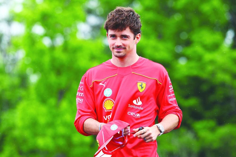 Charles Leclerc of Monaco and Ferrari looks on in the Paddock on Thursday, ahead of the F1 Grand Prix of Canada at Circuit Gilles Villeneuve in Montreal. (AFP)