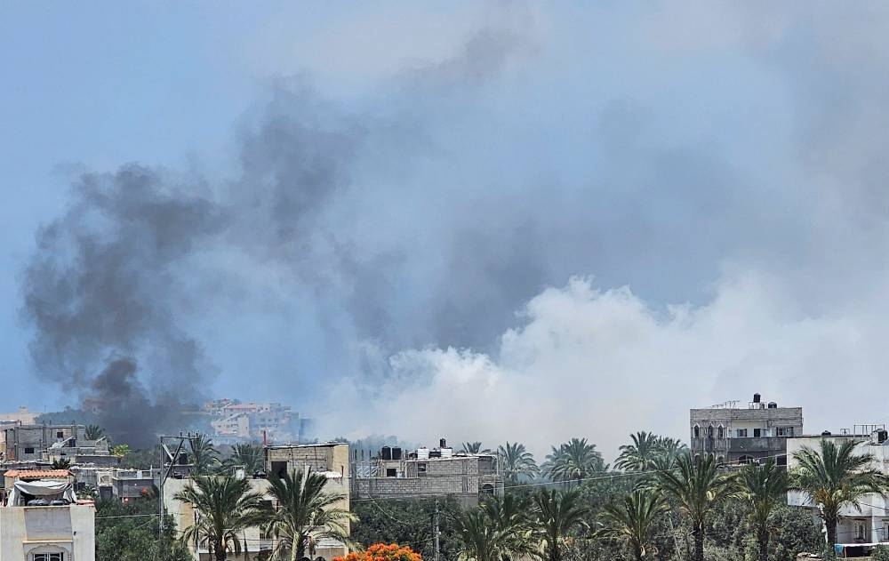 Smoke rises following an Israeli air strike, amid the Israel-Hamas conflict, in Nuseirat refugee camp, central Gaza Strip, Saturday. REUTERS