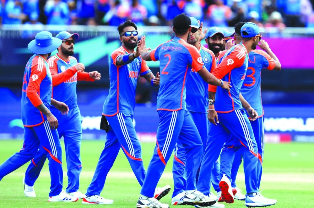 India’s Arshdeep Singh celebrates with teammates a wicket during their ICC T20 World Cup match against Pakistan at Nassau County International Cricket Stadium in New York on Sunday. (AFP)