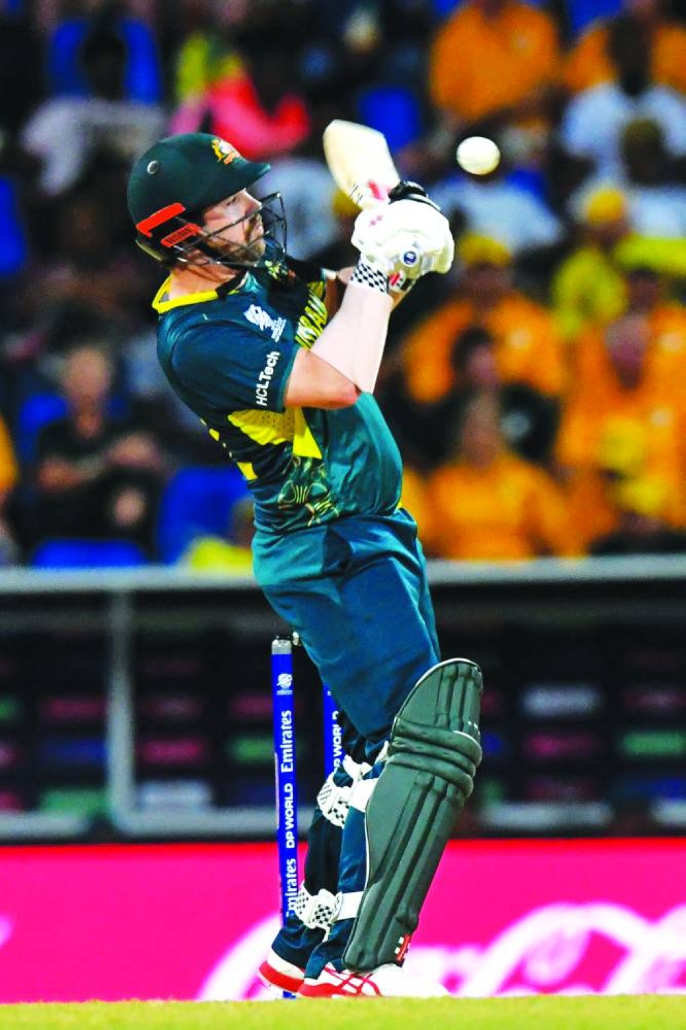 Australia’s Travis Head hits a boundary against Namibia on Wednesday. (AFP)