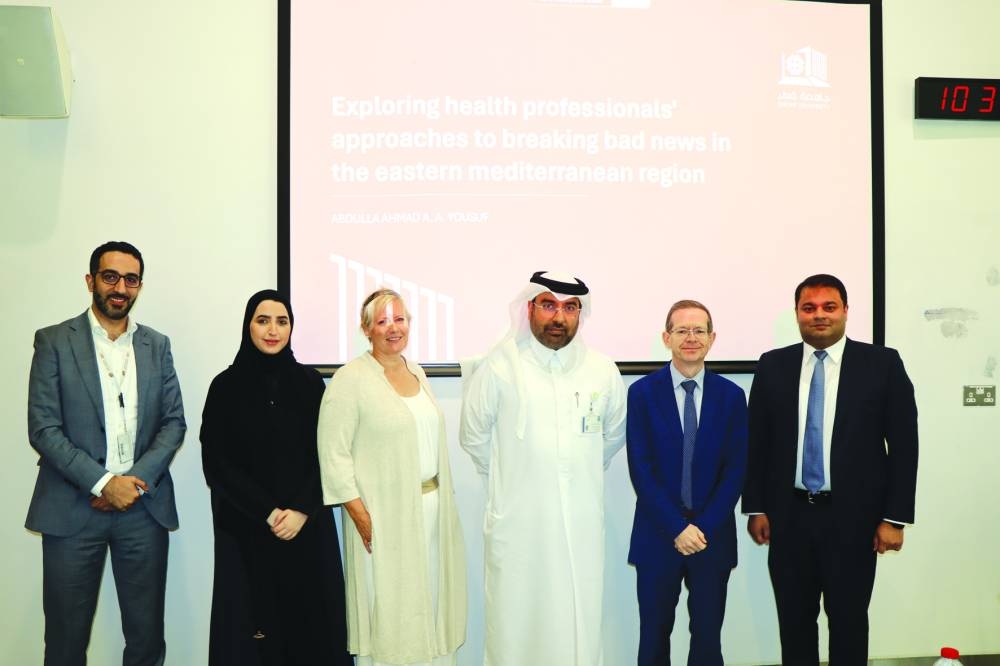 Graduate Abdulla Ahmad AH Yousuf with faculty members.