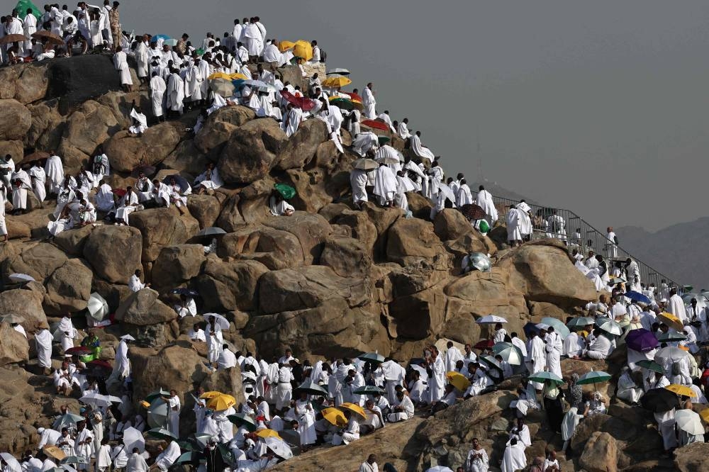 Muslim pilgrims pray at dawn on Saudi Arabia's Mount Arafat, also known as Jabal al-Rahma or Mount of Mercy, during the climax of the Haj pilgrimage on Saturday. AFP