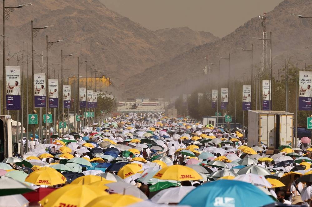 Pilgrims make their way towards Saudi Arabia's Mount Arafat during the climax of the Hajj pilgrimage on Saturday. AFP