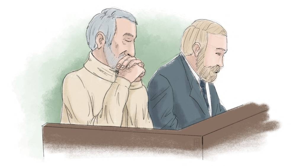 Hamid Noury, who is accused of involvement in the massacre of political prisoners in Iran in 1988, sits with attorney Thomas Soderqvist, during his trial, in this courtroom sketch, in Stockholm District Court, Sweden November 23, 2021. Anders Humlebo/TT News Agency via REUTERS.