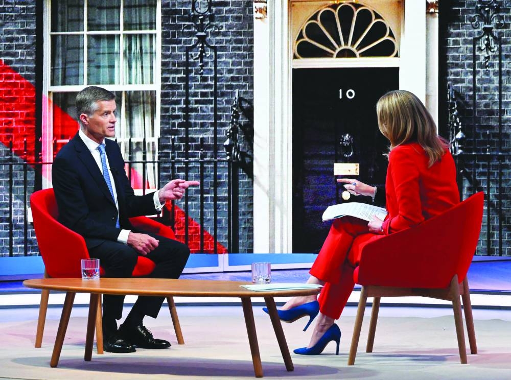 
Britain’s Secretary of State for Transport Mark Harper appears on the BBC’s Sunday Morning political television show with journalist Laura Kuenssberg. 