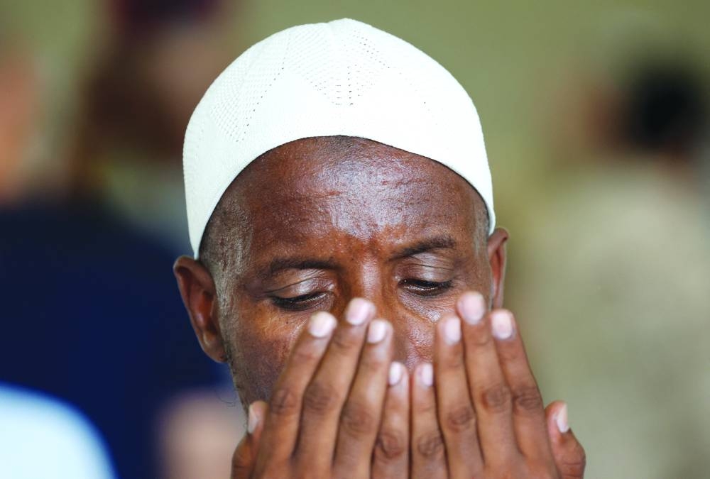 
Muslim pilgrims pray during the annual Haj pilgrimage in Mina, Saudi Arabia. 
