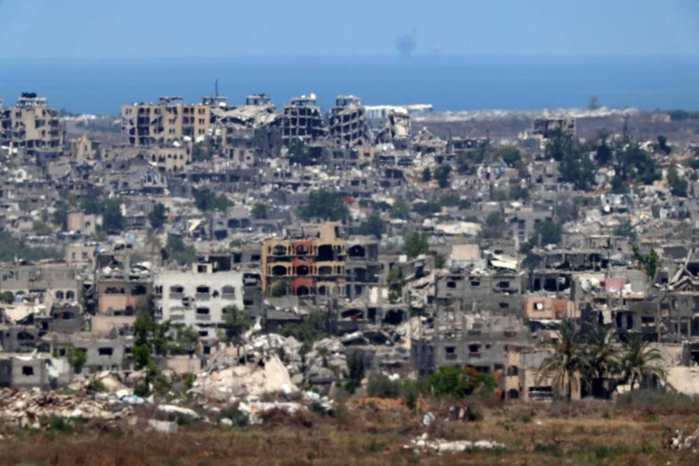 This picture taken from Israel's southern border with the Gaza Strip shows the destruction in the Palestinian territory, on Tuesday. AFP