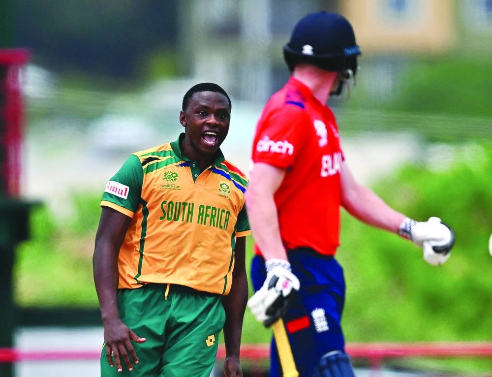 South Africa’s Kagiso Rabada (left) celebrates after England’s Liam Livingstone is caught out during the Twenty20 World Cup Super Eight match at Daren Sammy National Cricket Stadium in Gros Islet, Saint Lucia, on Friday. (AFP)
