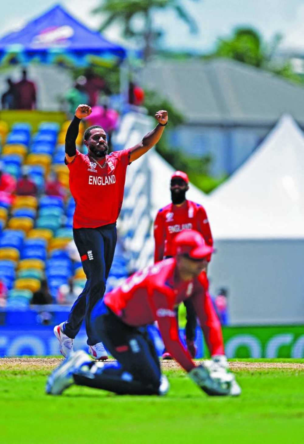 England’s Chris Jordan celebrates the dismissal of USA’s Nosthush Kenjige during the ICC Twenty20 World Cup 2024 Super Eight match at Kensington Oval in Bridgetown, Barbados, yesterday. (AFP)