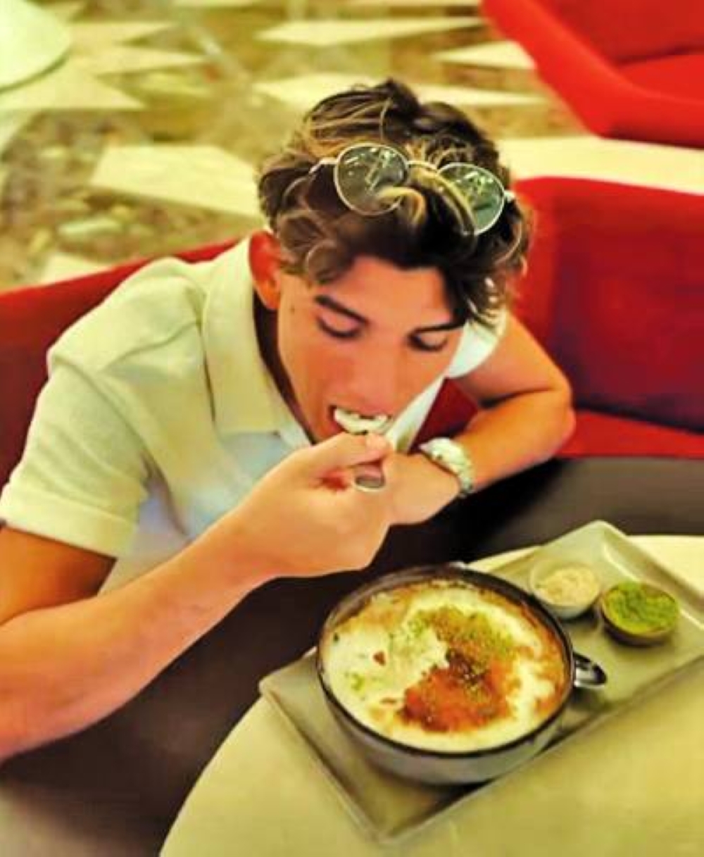 The campaign features the famous Um Ali dessert.