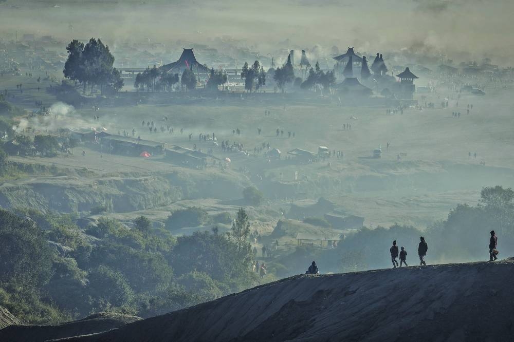 Tenggerese are seen ahead of the Yadnya Kasada festival at the Sea of Sands in Probolinggo, East Java, Indonesia. – Reuters