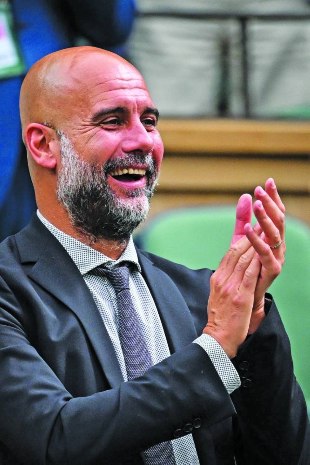 Manchester City's Spanish coach Pep Guardiola reacts in the Royal box on Centre Court during the sixth day of the 2024 Wimbledon Championships at The All England Lawn Tennis and Croquet Club in Wimbledon, southwest London, on Saturday. (AFP)