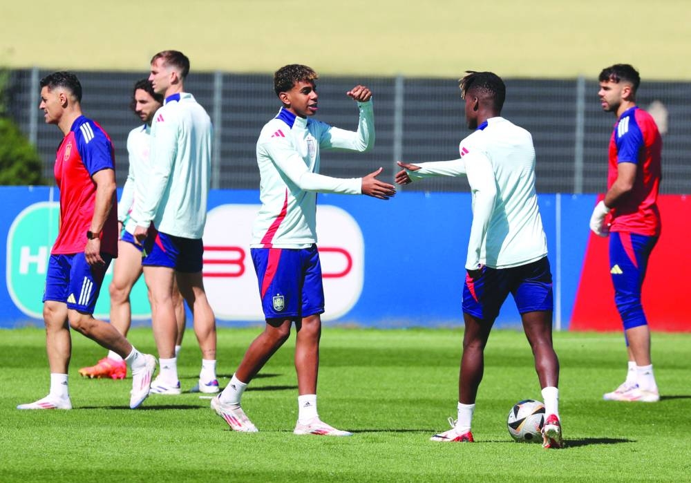 Spain’s Lamine Yamal and Nico Williams during a training session in Donaueschingen on Monday. (Reuters)