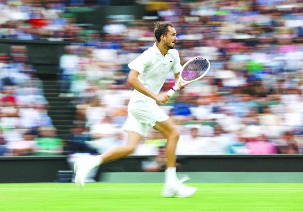 Russia’s Daniil Medvedev in action during his quarter-final match against Italy’s Jannik Sinner on the Centre Court at All England Lawn Tennis and Croquet Club, London, Britain, on Tuesday. (Reuters)