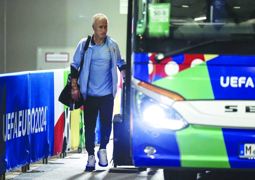 France’s head coach Didier Deschamps boards the bus to leave the stadium after the UEFA Euro 2024 semi-final against Spain at the Munich Football Arena in Munich. (AFP) 