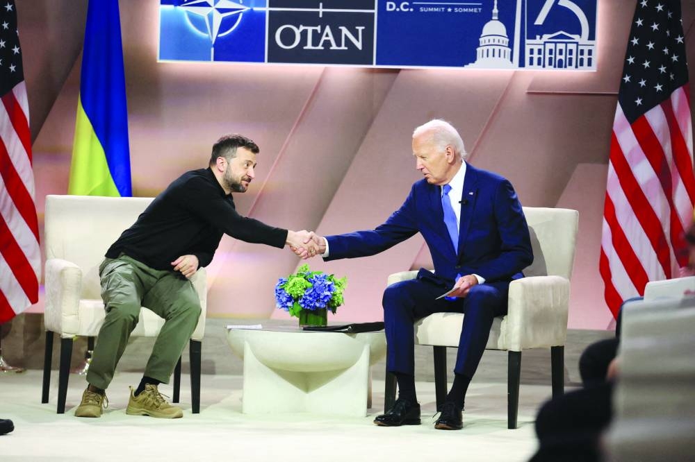 Ukraine’s President Volodymyr Zelensky shakes hands with US President Joe Biden during a bilateral meeting in Washington on Thursday. (Reuters)
