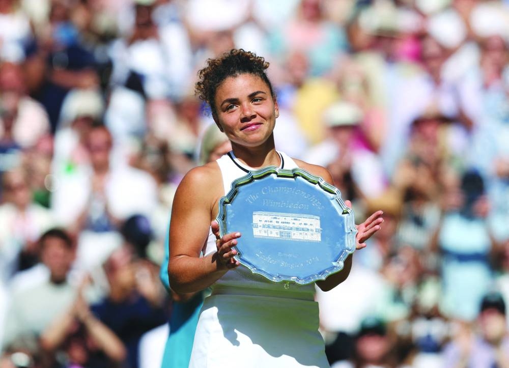 Jasmine Paolini poses with the runners up trophy on Saturday. (Reuters)