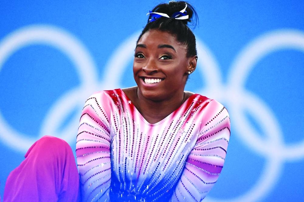 USA’s Simone Biles waits ahead of the balance beam final of the Tokyo 2020 Olympic Games in Tokyo on August 3, 2021. (AFP) 