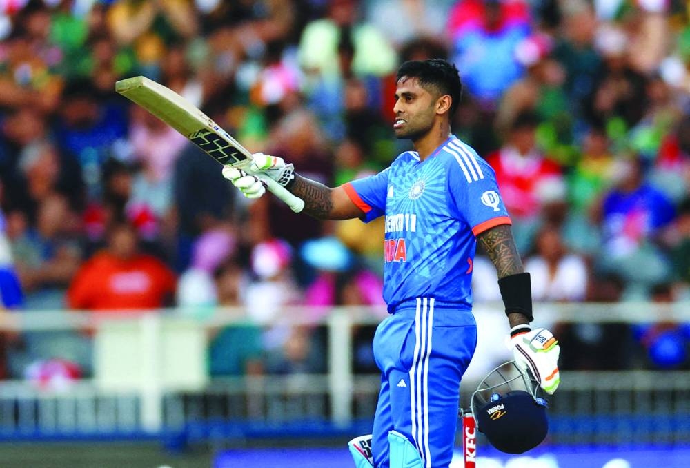 
India’s Suryakumar Yadav celebrates after reaching his century in the third T20 International against South Africa at Wanderers Stadium in Johannesburg on December 14, 2023. (Reuters) 