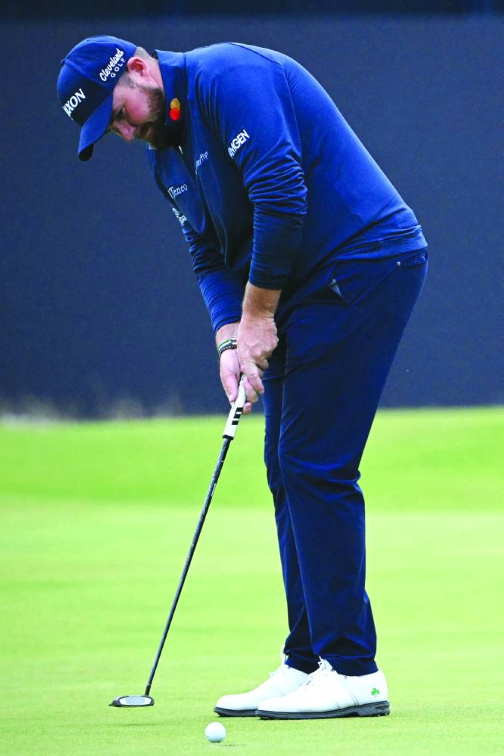 Ireland’s Shane Lowry makes a birdie putt on the 18th green on the opening day of the 152nd British Open Golf Championship at Royal Troon on the south west coast of Scotland on Thursday. (AFP)