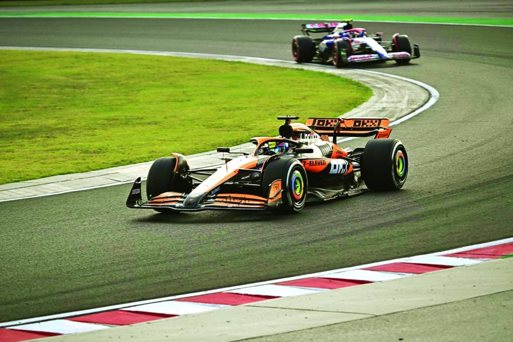McLaren’s Lando Norris (also inset) drives during the second practice session at the Hungaroring race track in Mogyorod near Budapest on Friday, ahead of the Formula One Hungarian Grand Prix. (AFP)